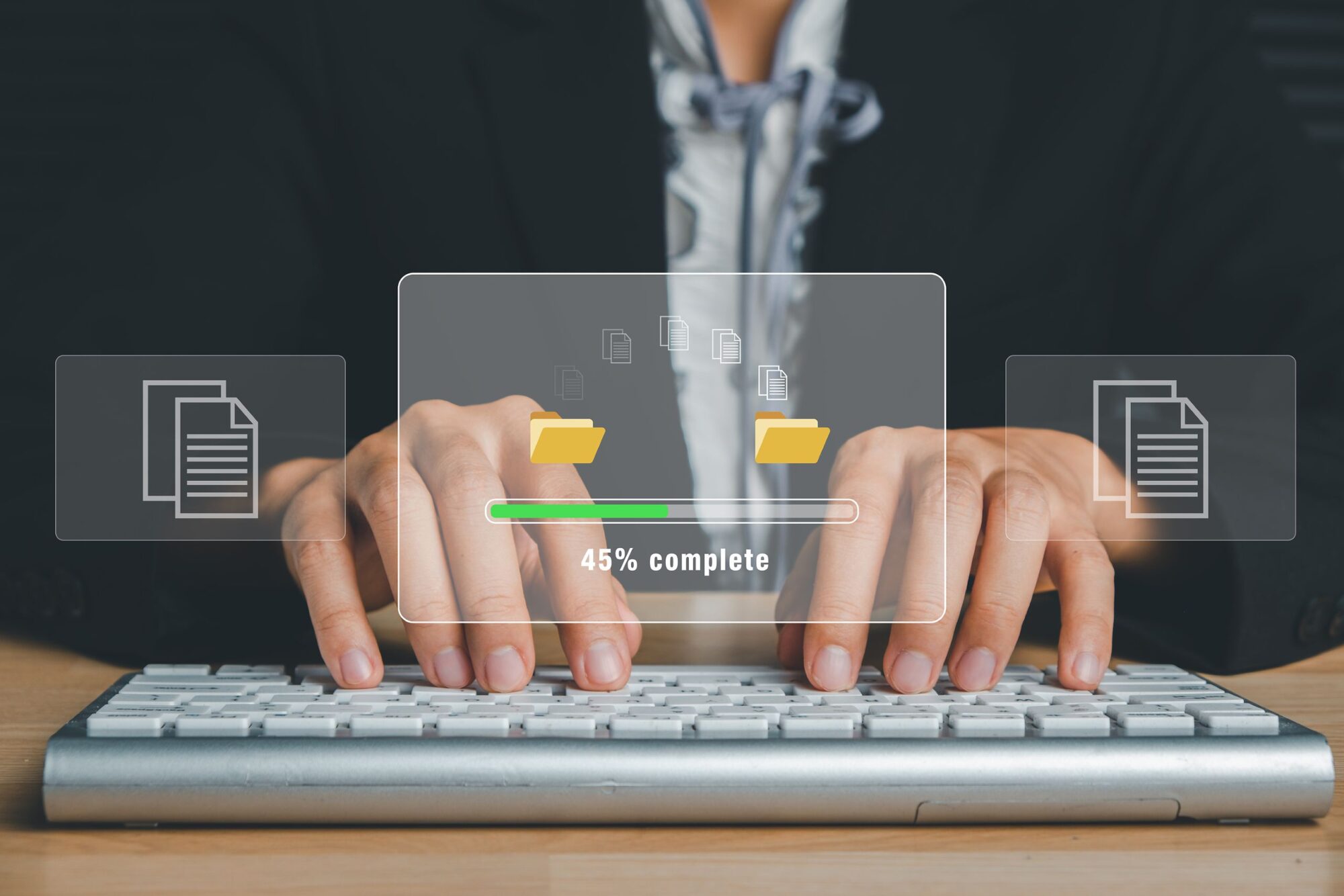 Person typing on keyboard waiting for transfer file process with loading bar icon on virtual screen.